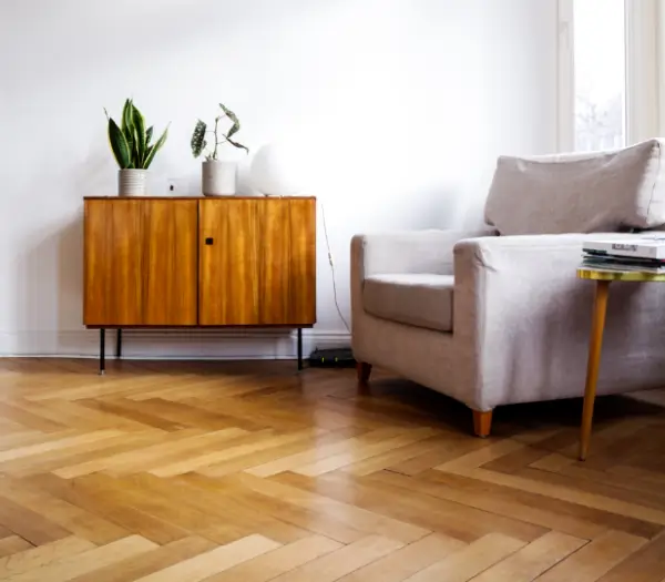 Herringbone hardwood flooring installation in an Austin, TX home