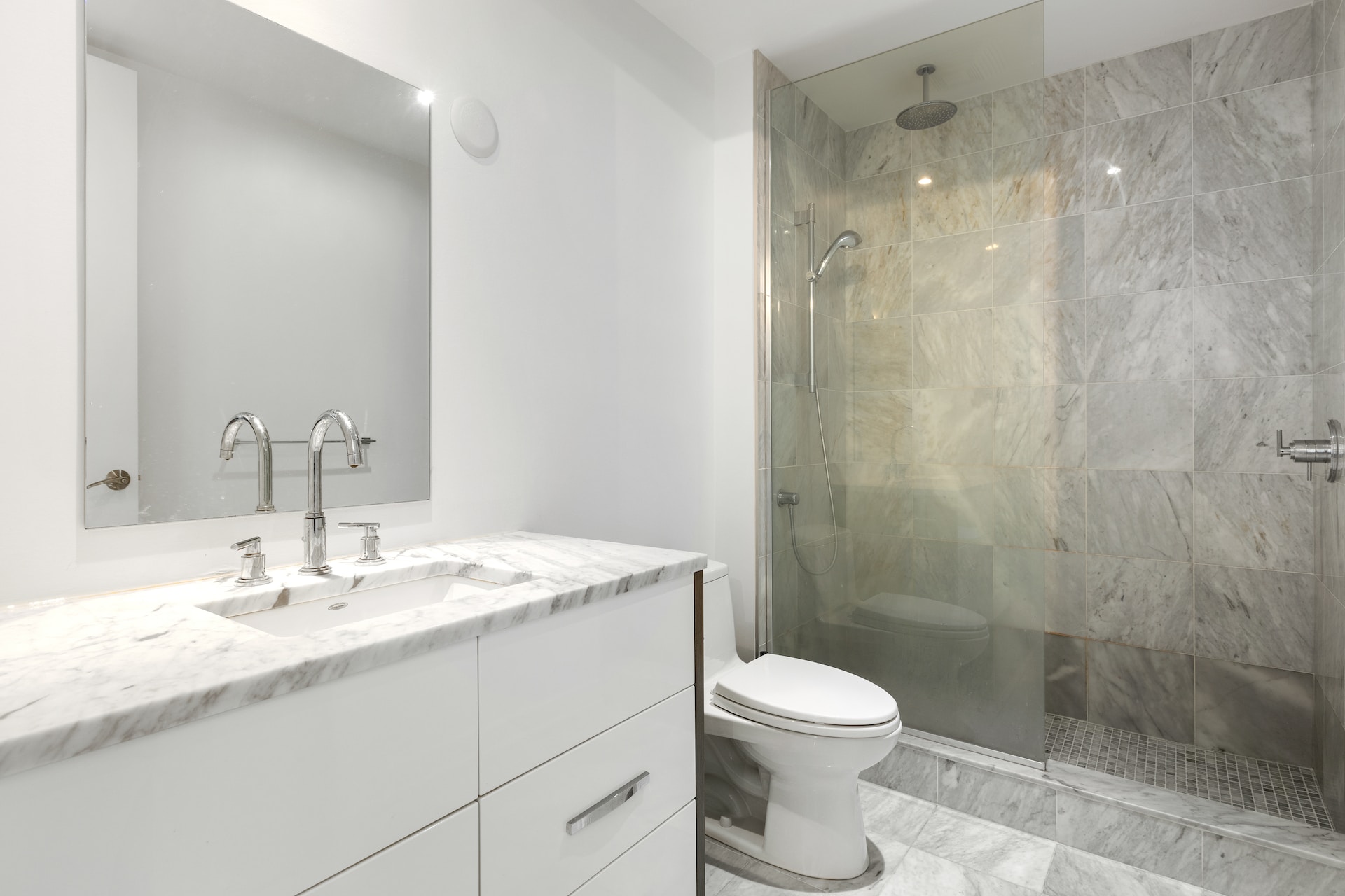 Tile flooring and shower in a Tucson, AZ guest bathroom