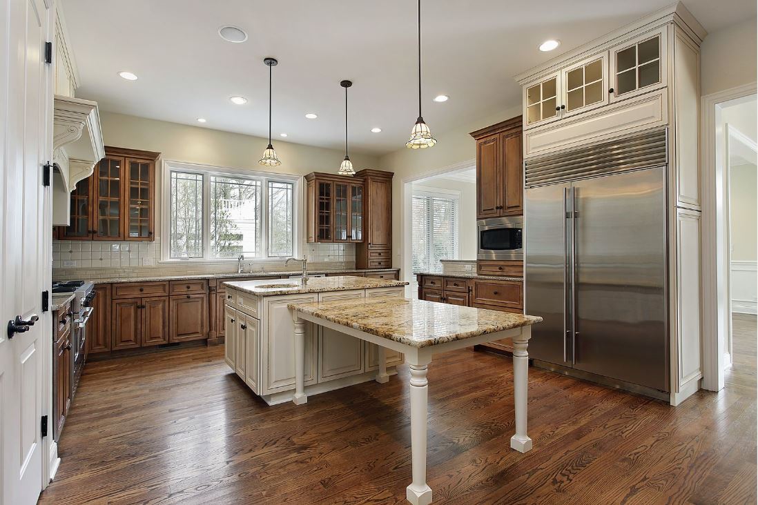 Color coordinating cabinets and hardwood flooring in a Phoenix, AZ kitchen
