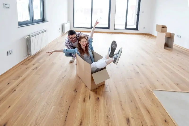 couple in new home with new flooring