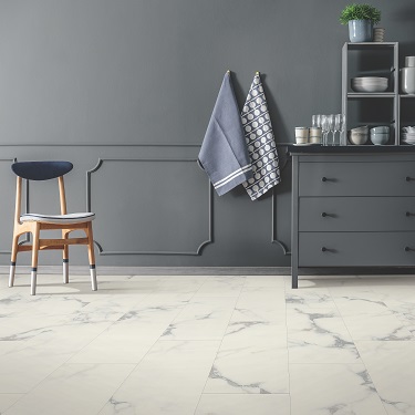 Natural marble look luxury vinyl flooring in a Tucson, AZ home