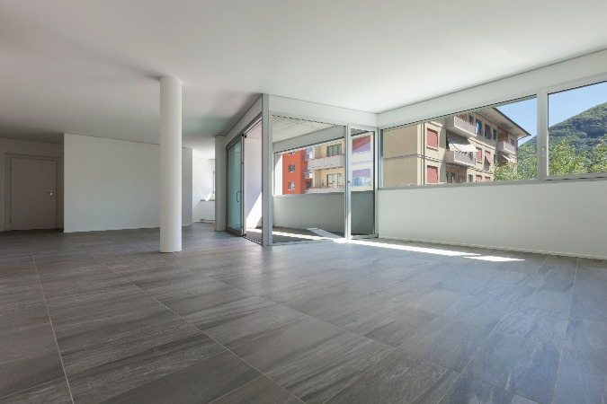 empty apartment with large tile floor
