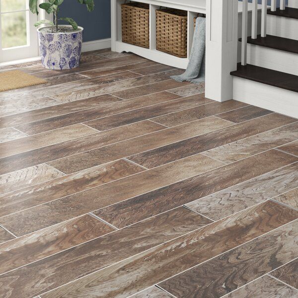 Wood flooring in a house at the bottom of the stairs