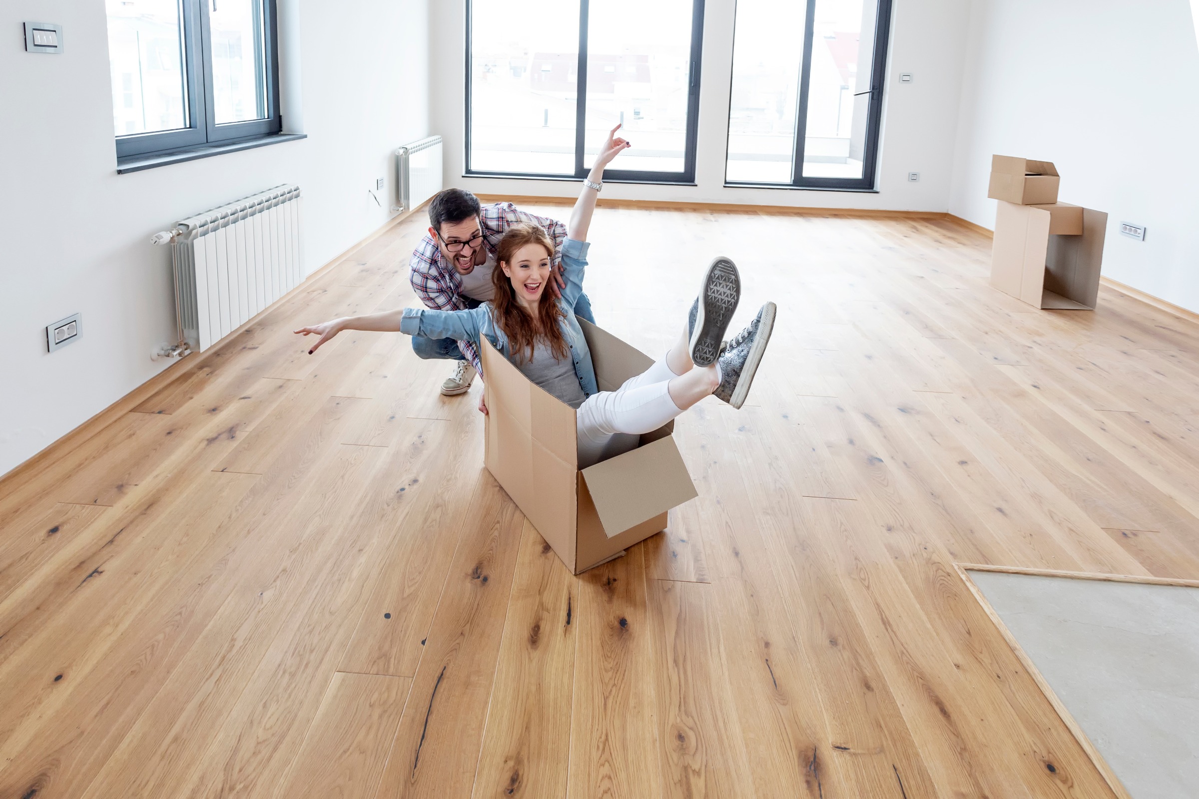 couple in new home with new flooring