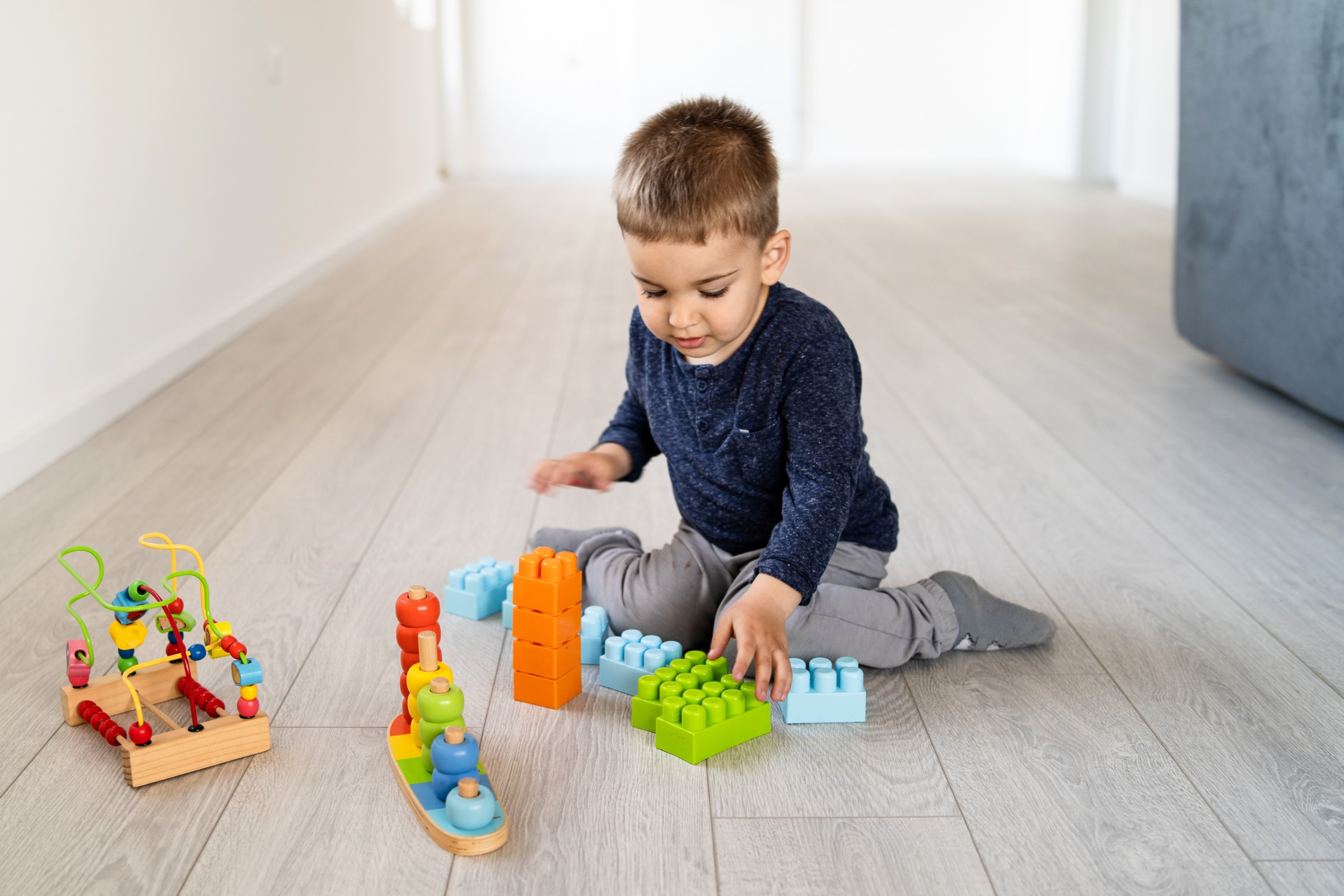 young child playing on LVP floor